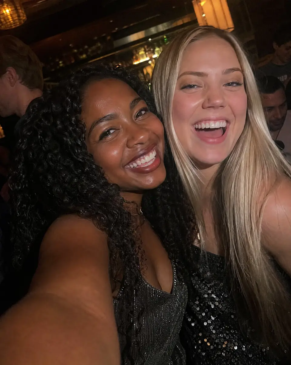 Night-out selfie of two friends, straight from a phone camera